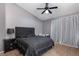 Bedroom featuring dark furniture and natural lighting at 2631 Bed Knoll Ct, North Las Vegas, NV 89031