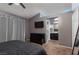 Bedroom featuring dark furniture, carpet flooring, and ensuite bath at 2631 Bed Knoll Ct, North Las Vegas, NV 89031
