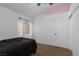 A bedroom featuring carpet, natural light, and a spacious closet at 2631 Bed Knoll Ct, North Las Vegas, NV 89031