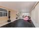 Spacious bonus room with gym equipment and play area with natural light at 2631 Bed Knoll Ct, North Las Vegas, NV 89031