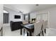 Elegant living room features neutral walls, stylish furniture, and a dining area, great for gatherings at 2631 Bed Knoll Ct, North Las Vegas, NV 89031