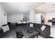 Open-concept living area seamlessly flows into the kitchen, perfect for modern living and entertaining at 2631 Bed Knoll Ct, North Las Vegas, NV 89031