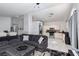 Open-concept living area seamlessly flows into the kitchen, perfect for modern living and entertaining at 2631 Bed Knoll Ct, North Las Vegas, NV 89031