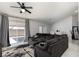 An inviting living room with sliding glass doors, lots of natural light, and views of the patio at 2631 Bed Knoll Ct, North Las Vegas, NV 89031
