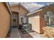 Cozy front patio with a table and chairs, great for outdoor relaxation and entertaining at 2631 Bed Knoll Ct, North Las Vegas, NV 89031