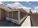 Sunroom featuring multiple windows and access door to the backyard at 2631 Bed Knoll Ct, North Las Vegas, NV 89031