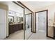 Beautiful bathroom with a dual vanity sink, shower, and a mirrored closet at 2725 Byron Dr, Las Vegas, NV 89134