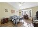 Comfortable bedroom with a bay window, a piano, and hardwood floors at 2725 Byron Dr, Las Vegas, NV 89134