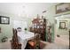 Elegant dining room with chandelier, large hutch, and seating for six at 2725 Byron Dr, Las Vegas, NV 89134
