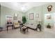 Cozy living room features tile floors, neutral decor, and plenty of natural light at 2725 Byron Dr, Las Vegas, NV 89134