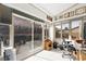 Bright sun room featuring many windows with view of private backyard at 2725 Byron Dr, Las Vegas, NV 89134