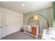 Stylish Bedroom showcasing a crib, decorative accents, and neutral tones for a serene setting at 3402 La Cura Ave # Lot 69, Las Vegas, NV 89141