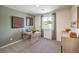 Well-lit office space with a modern desk, neutral walls, and a window with green views at 3402 La Cura Ave # Lot 69, Las Vegas, NV 89141
