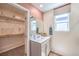 Walk-in closet with ample shelving, providing organized storage and easy access to your wardrobe at 3402 La Cura Ave # Lot 69, Las Vegas, NV 89141