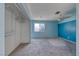 Spacious carpeted bedroom with natural light, closet, and ceiling fan at 4100 Montebello Ave, Las Vegas, NV 89110