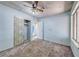 This bedroom offers comfortable living with carpeted floors, a closet, and ample natural light at 4100 Montebello Ave, Las Vegas, NV 89110