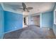 Comfortable bedroom with wall-to-wall carpeting, closet, and ample natural light at 4100 Montebello Ave, Las Vegas, NV 89110