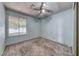 Cozy bedroom featuring carpeted floors and a window overlooking the outdoors at 4100 Montebello Ave, Las Vegas, NV 89110