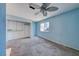 Sunlit bedroom features wall-to-wall carpeting, closet, and a bright window at 4100 Montebello Ave, Las Vegas, NV 89110