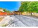 Charming single-story home featuring a spacious front yard with mature trees and covered parking at 4100 Montebello Ave, Las Vegas, NV 89110