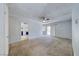 Open-concept living room with carpet floors and sliding glass doors at 4100 Montebello Ave, Las Vegas, NV 89110