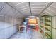 The home's shed offers plenty of storage space and room for a workbench, with shelving already installed at 4100 Montebello Ave, Las Vegas, NV 89110