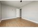 A cozy bedroom features light-colored wood floors and neutral walls at 419 National St, Henderson, NV 89015