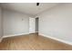 Empty bedroom featuring modern wood floors and neutral colored walls at 419 National St, Henderson, NV 89015
