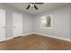 Well lit bedroom with modern wood flooring and large double door closet at 419 National St, Henderson, NV 89015