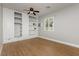 Bedroom with custom shelving and drawers, and an AC unit at 419 National St, Henderson, NV 89015