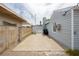 A concrete driveway leading to a gated entrance, offering parking and security for the home at 419 National St, Henderson, NV 89015
