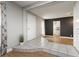 Welcoming entryway boasting neutral tile flooring that flows into a living space with wood flooring at 419 National St, Henderson, NV 89015