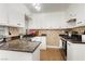 Bright kitchen with stainless steel appliances and granite countertops provides ample workspace at 419 National St, Henderson, NV 89015