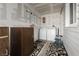 Practical laundry area equipped with washer, dryer, cabinet and convenient access to outside at 419 National St, Henderson, NV 89015