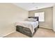 This bedroom has a bed with storage and window at 4195 Story Rock St, Las Vegas, NV 89115