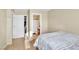 Cozy bedroom featuring a bed, carpet and doorway to the bathroom at 4195 Story Rock St, Las Vegas, NV 89115