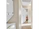 View of a hallway leading to a bathroom, with the laundry on the left at 4195 Story Rock St, Las Vegas, NV 89115