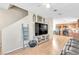 Inviting living room with laminate flooring and staircase with an open concept layout at 4195 Story Rock St, Las Vegas, NV 89115