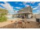 Enjoyable backyard featuring a pool, fire pit, and patio area, perfect for outdoor entertaining at 4666 Plata Del Sol Dr, Las Vegas, NV 89121