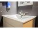 Bathroom vanity featuring a white sink and modern silver faucet at 4666 Plata Del Sol Dr, Las Vegas, NV 89121