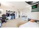Bedroom with a gaming chair and decorated with wall art at 4666 Plata Del Sol Dr, Las Vegas, NV 89121