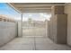 Wide-angle of the driveway with gate, showing the property's accessible parking area at 4666 Plata Del Sol Dr, Las Vegas, NV 89121