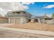 Unique two-story home featuring a rooftop deck, a two-car garage and solar panels at 4666 Plata Del Sol Dr, Las Vegas, NV 89121