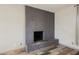 Elegant fireplace with a brick hearth, perfect for gatherings at 4666 Plata Del Sol Dr, Las Vegas, NV 89121