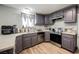 Modern kitchen with stainless steel appliances, ample cabinets, and a stylish backsplash at 4666 Plata Del Sol Dr, Las Vegas, NV 89121