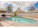 Backyard oasis showcasing a private pool with mature trees at 4666 Plata Del Sol Dr, Las Vegas, NV 89121
