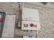 Close up view of the solar panel electrical box mounted on the exterior of the home at 4666 Plata Del Sol Dr, Las Vegas, NV 89121