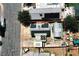 Aerial view of home with solar panels, covered entry, a carport, and a large workshop at 4682 Tamalpias Ave, Las Vegas, NV 89120
