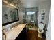 Bathroom features glass shower doors, a vanity, and a standard toilet at 4682 Tamalpias Ave, Las Vegas, NV 89120