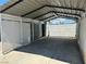 View of the covered carport showcasing its gated entry and ample parking space at 4682 Tamalpias Ave, Las Vegas, NV 89120